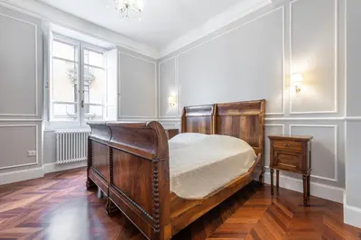 Letto o letti in una camera di Regina Elena - Antica Dimora, Bastione S. Remy