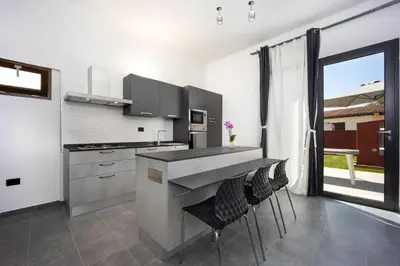 Cucina o angolo cottura di Coru e Mari 2 Apartments