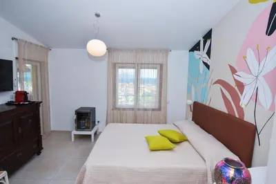 Letto o letti in una camera di Vicocolli Rooms
