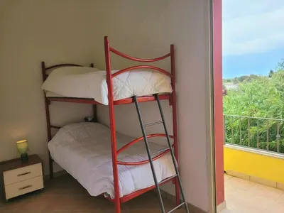 Letto o letti in una camera di Appartamento a Pula in zona residenziale
