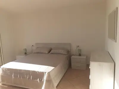 Letto o letti in una camera di Appartamento a Pula in zona residenziale