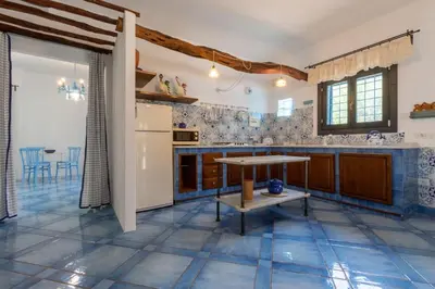 Cucina o angolo cottura di Sogno Mediterraneo Pula Sardegna villa a soli 300 mt dal mare