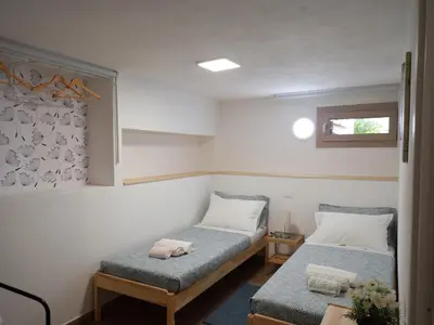 Letto o letti in una camera di Vacanze Nella casetta