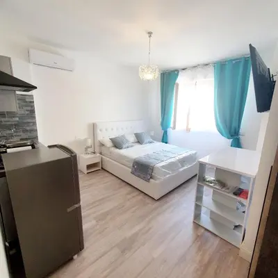Letto o letti in una camera di Villa Volta 4 Policlinico Monserrato
