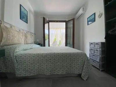 Letto o letti in una camera di Casa vacanza Ferrara IUN P5547