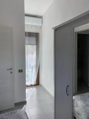 Letto o letti in una camera di Casa vacanza Ferrara IUN P5547