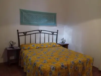 Letto o letti in una camera di Canne Al Vento