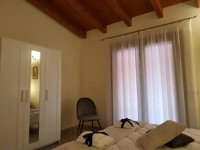 Letto o letti in una camera di Grace dell'isola dei Coralli