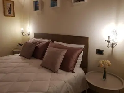 Letto o letti in una camera di Grace dell'isola dei Coralli