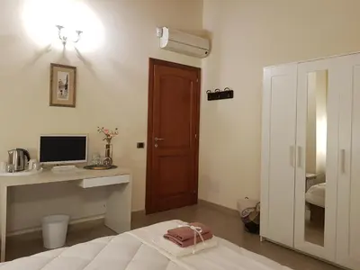 Letto o letti in una camera di Grace dell'isola dei Coralli