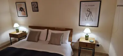 Letto o letti in una camera di Grace dell'isola dei Coralli