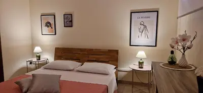 Letto o letti in una camera di Grace dell'isola dei Coralli