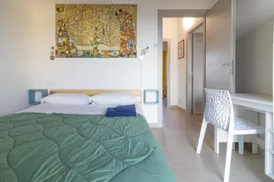 Letto o letti in una camera di DOMEK Villa a 100mt dalla spiaggia