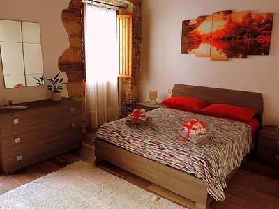 Letto o letti in una camera di Sa Fabbrica de Sant'Anna