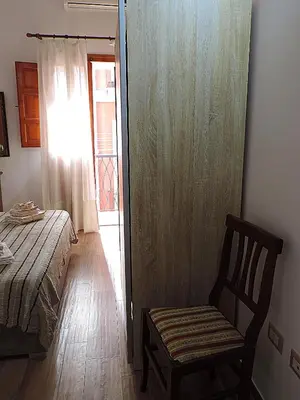 Letto o letti in una camera di Sa Fabbrica de Sant'Anna