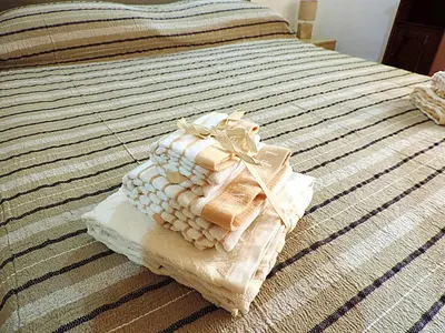 Letto o letti in una camera di Sa Fabbrica de Sant'Anna