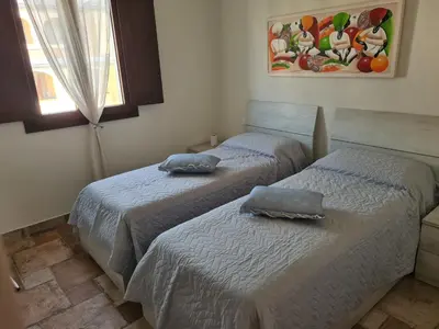 Letto o letti in una camera di Giolet's House