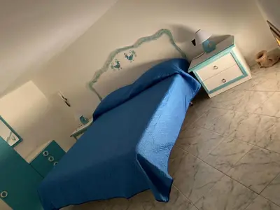 Letto o letti in una camera di Cià Evelina