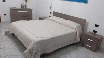 Letto o letti in una camera di Cià Evelina