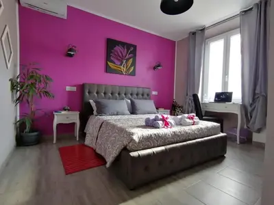 Letto o letti in una camera di Dimora Bed and Breakfast