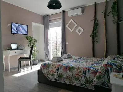 Letto o letti in una camera di Dimora Bed and Breakfast
