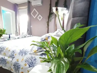 Letto o letti in una camera di Dimora Bed and Breakfast