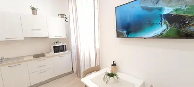 Cucina o angolo cottura di SUITE BLANC APARTMENTS - Monolocali indipendenti con cucina e bagno privato - Check-in e check-out con codice in autonomia h24 - Terrazza in comune NECESSARIO AVERE WATHSAPP O APP DI MESSAGGISTICA ISTANTANEA PER FOTO E VIDEO