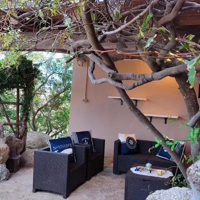 Area soggiorno di Villa Milena Villasimius, WiFi gratuito, Ampio Giardino a 300 m dal Mare