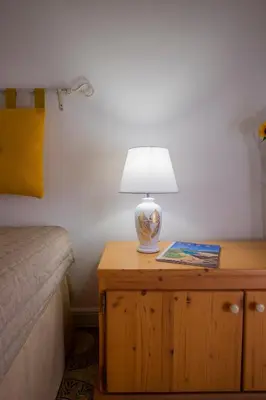 Letto o letti in una camera di Hotel Soleo
