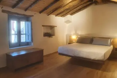 Letto o letti in una camera di Casetta da scoprire a due passi dal centro