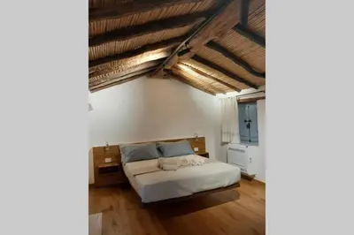 Letto o letti in una camera di Casetta da scoprire a due passi dal centro