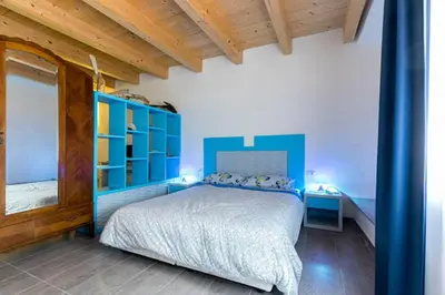 Letto o letti in una camera di Residenza Cuntin