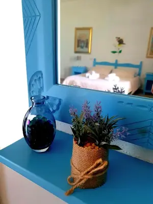 Letto o letti in una camera di Palmas Anna's rooms Is Procilis