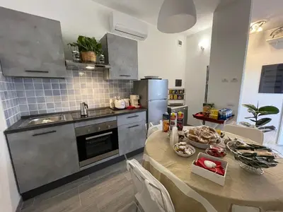 Cucina o angolo cottura di La cittadella rooms