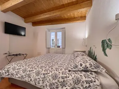 Letto o letti in una camera di Al Duomo di Cagliari