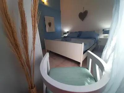 Letto o letti in una camera di Casa Ester