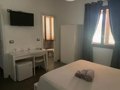 Letto o letti in una camera di B&B Il Sogno di Mario