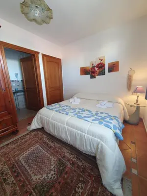 Letto o letti in una camera di Sinis Apartment