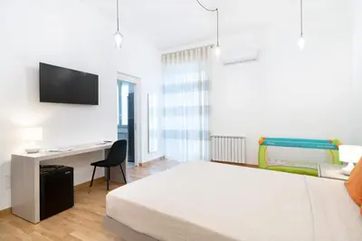 Letto o letti in una camera di L'isola che c'è