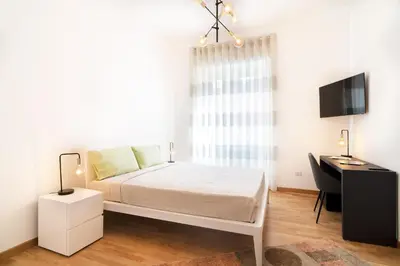 Letto o letti in una camera di L'isola che c'è