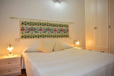 Letto o letti in una camera di Oleandro