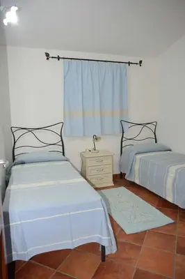 Letto o letti in una camera di Oleandro