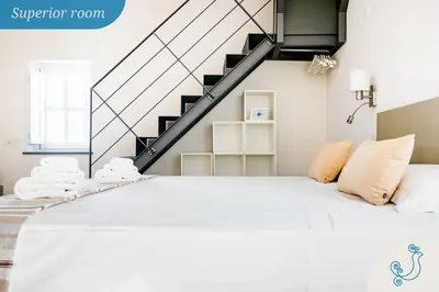 Letto o letti in una camera di Karú Suites