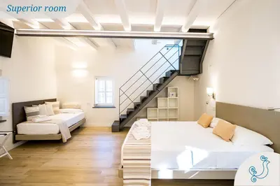 Letto o letti in una camera di Karú Suites