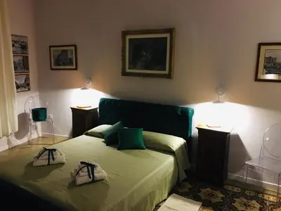 Letto o letti in una camera di Antica dimora lamarmora