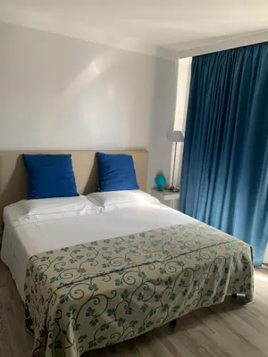 Letto o letti in una camera di L'Oasi Di Franco