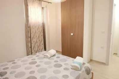 Letto o letti in una camera di Appartamenti Renzo&Rita1 Jolanda