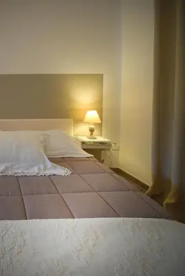 Letto o letti in una camera di Panoramic Studio Carloforte