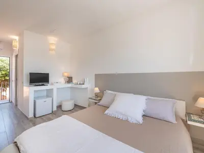 Letto o letti in una camera di Panoramic Studio Carloforte