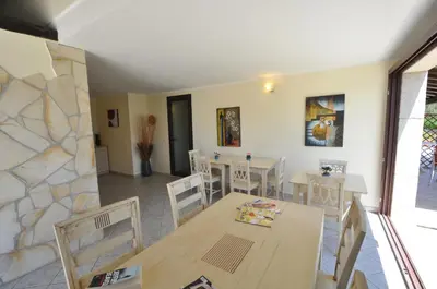 Area soggiorno di Affittacamere B&B La Villa dei Graniti